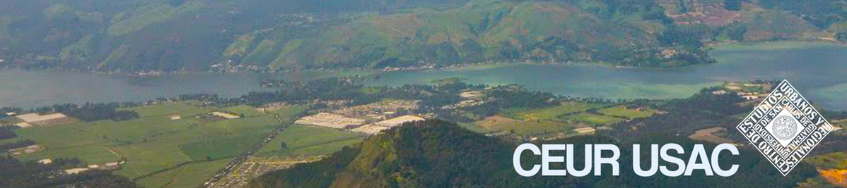 Vista aérea de la cabecera municipal de Villa Canales, el Lago de Amatitlán y los volcanes de Agua, Acatenango y Fuego